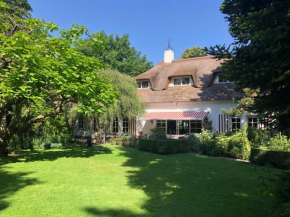 Bed and Breakfast De Haen - Privé-appartementen van 43 of 60 m2 met tweepersoons bubbelbad - Finse sauna - in westvleugel van luxe villa